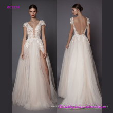 La robe de mariée en dentelle multicouche fantaisie avec ligne haute ouverte sur le côté